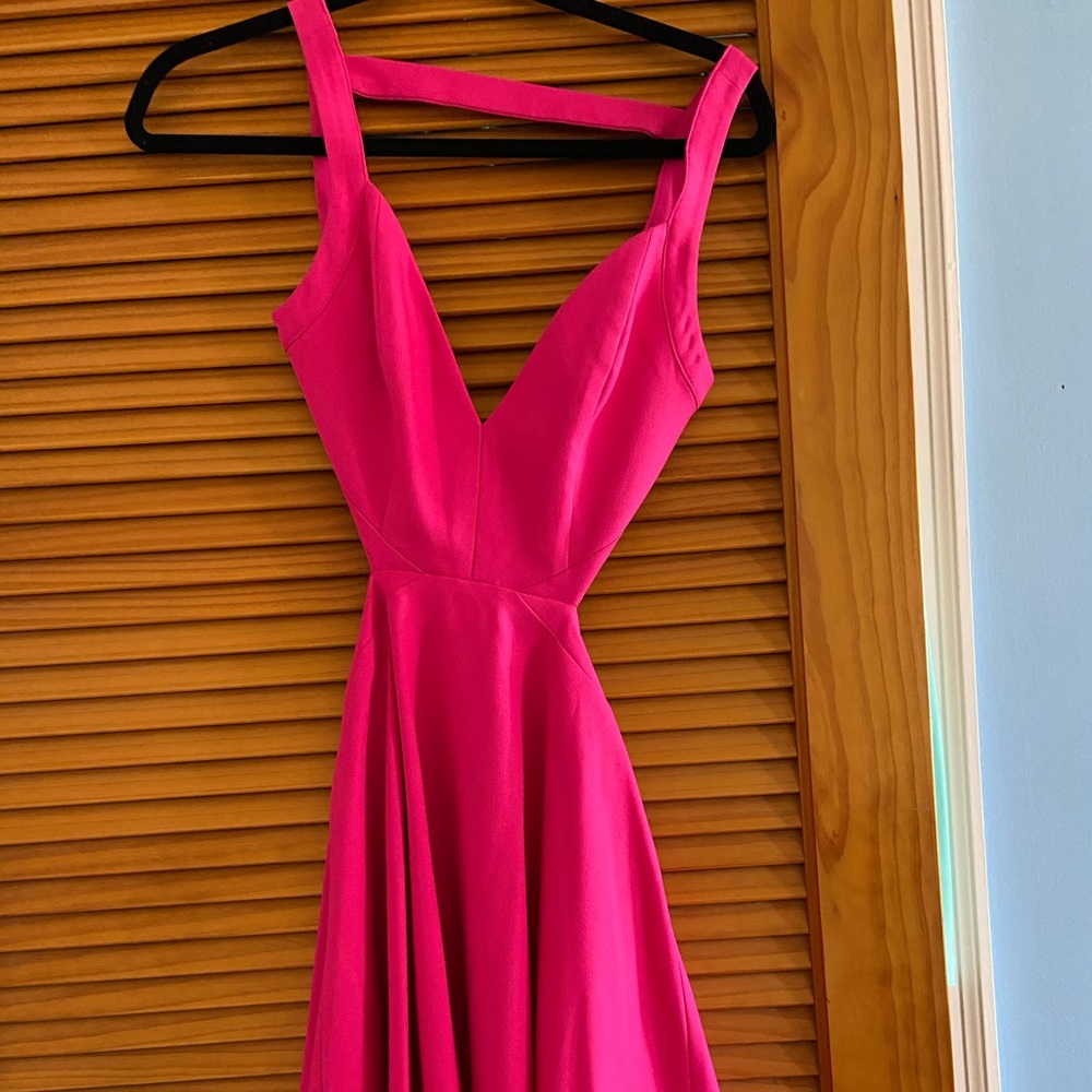 Pink short dress with open sides and back